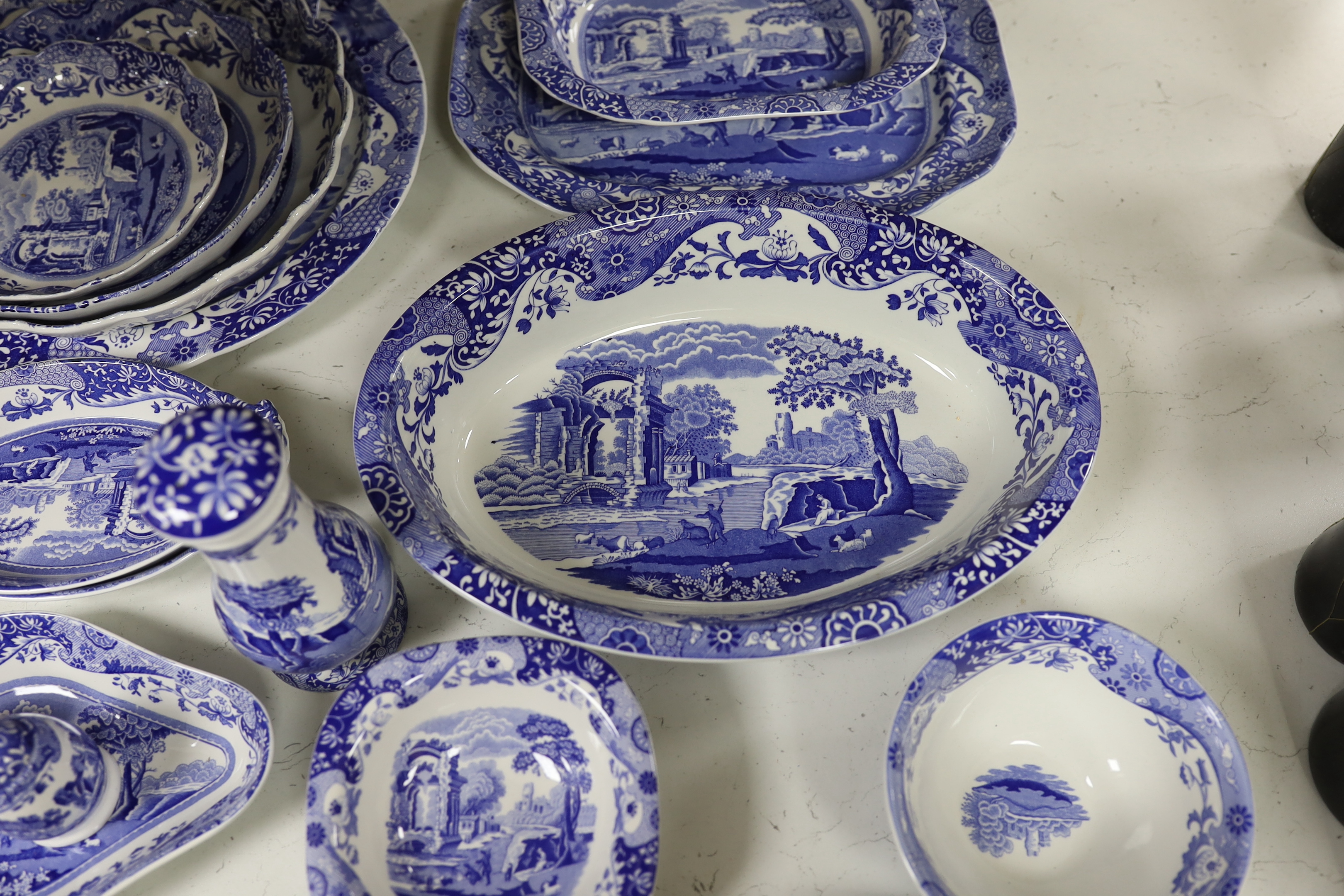 A collection of Spode Italian blue and white various sized serving dishes, cruets etc